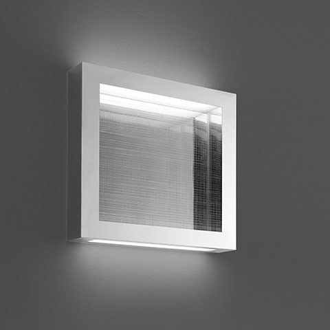 Artemide Altrove wall lamp: square white frame with textured glass diffuser emitting soft indirect light upward and downward
