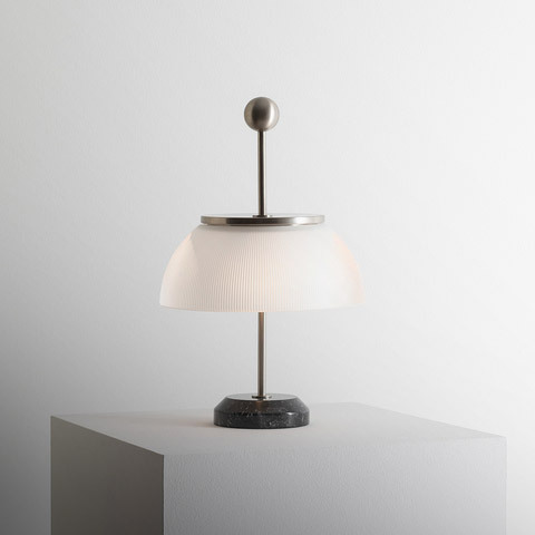 Artemide Alfa table lamp with ribbed white glass shade, brushed metal stem and ring, spherical finial, and black marble base