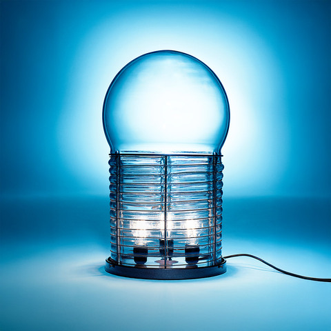 Artemide Alcinoo table lamp: cylindrical ribbed glass base with exposed bulbs and a clear blue spherical glass dome on top