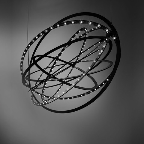 Artemide Copernico pendant lamp: black interlocking rings of varying sizes forming a sphere, with LED light points along the rings