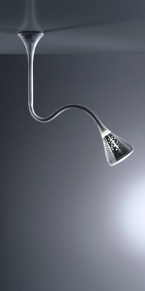 Artemide Pipe INTEGRALIS ceiling lamp with flexible chrome gooseneck arm and conical LED head emitting focused downward light