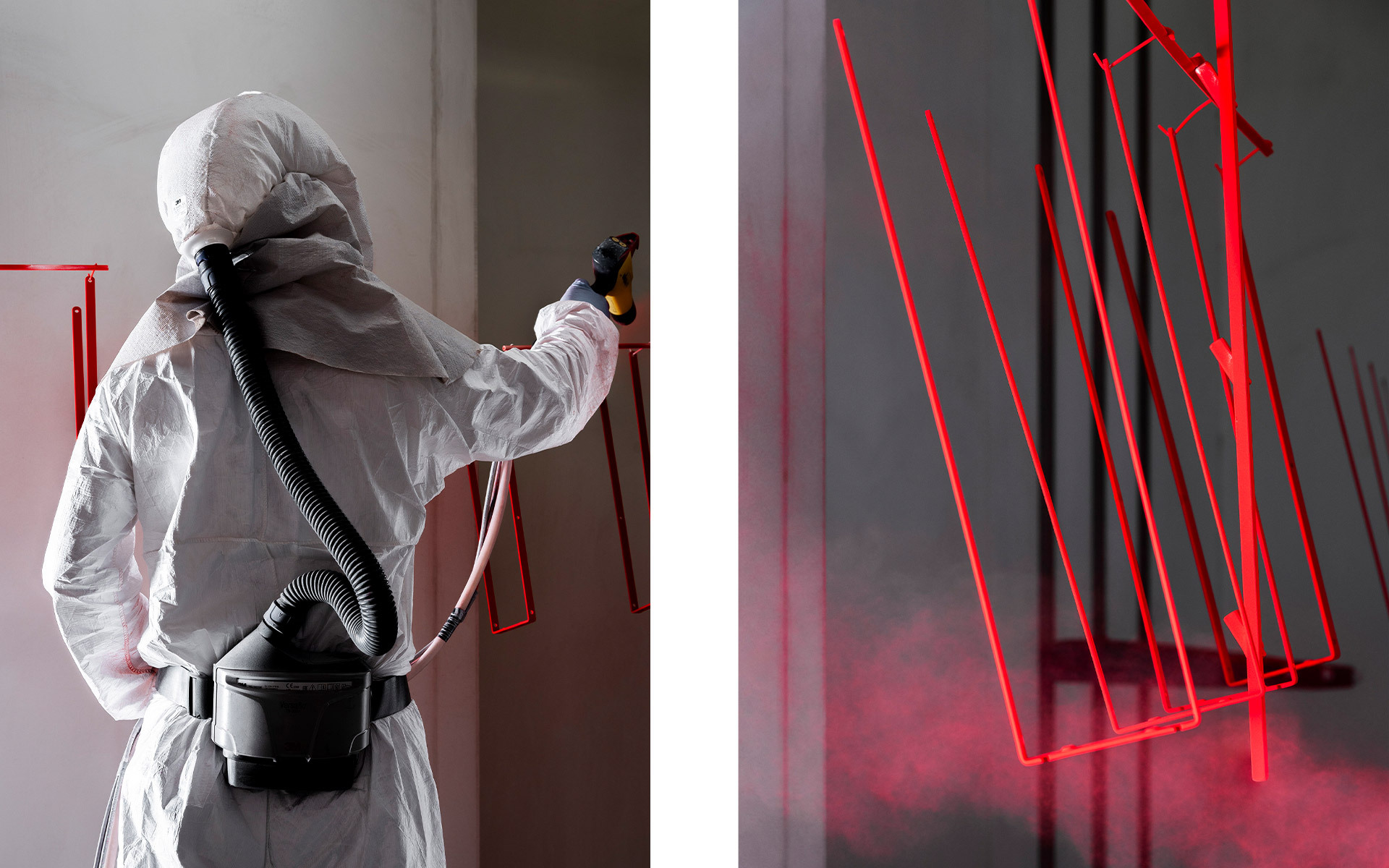 Worker in protective suit spray-painting red angular metal structures, shown alongside the finished red geometric lamp frames.