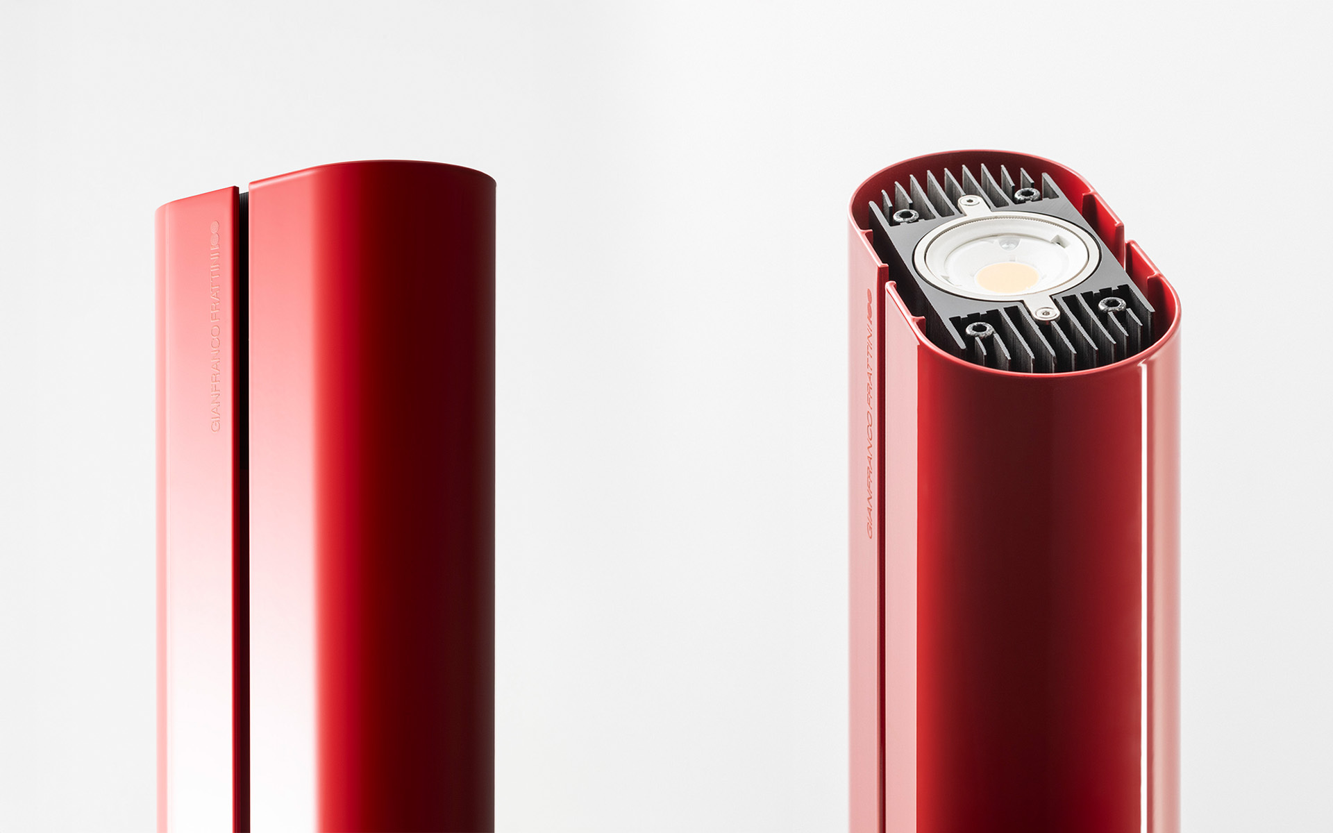 Red cylindrical LED floor lamp shown closed and open, revealing internal heat sink and LED module with adjustable head