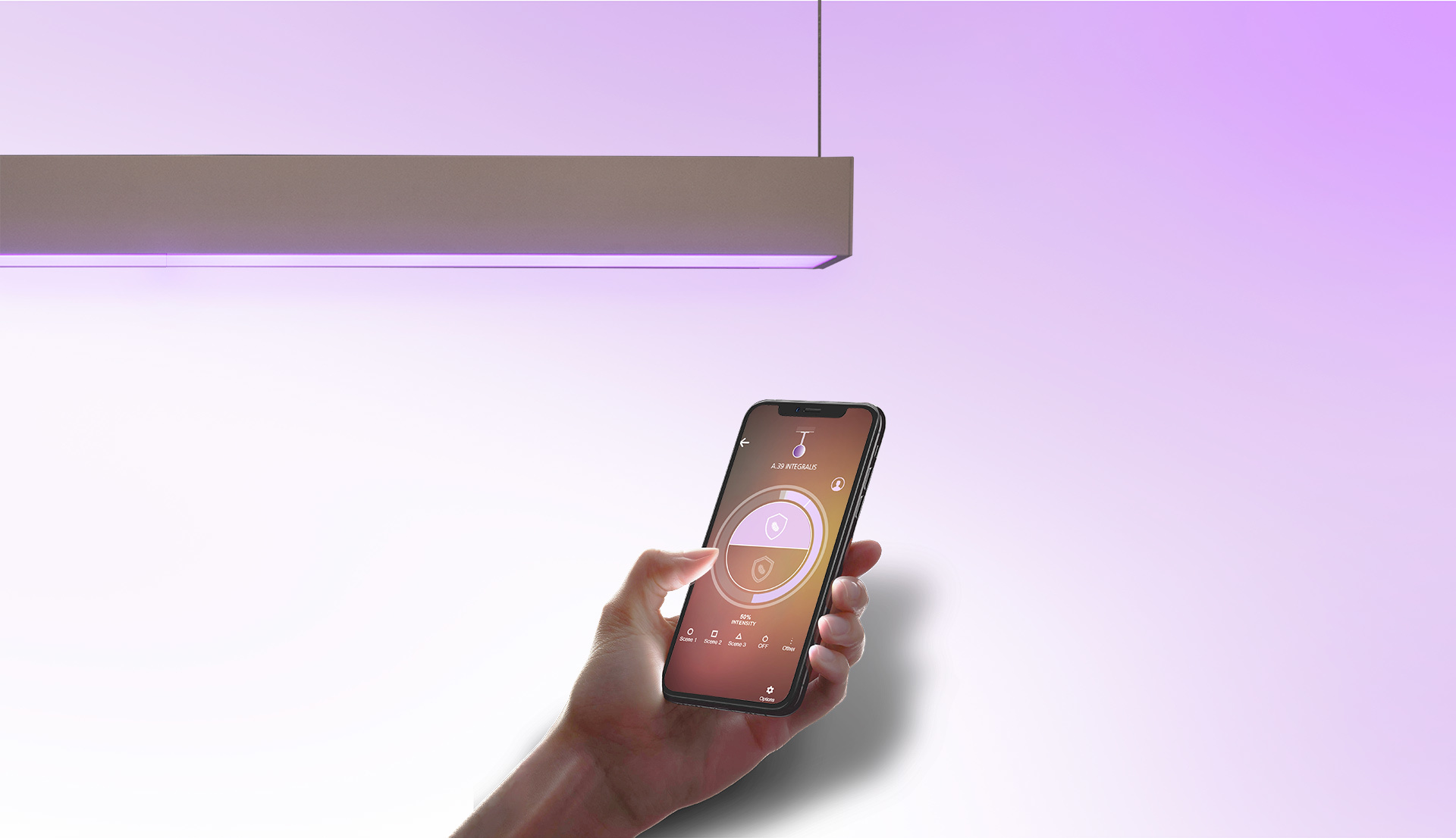 Hand holding a smartphone with Artemide app controlling a suspended linear LED lamp emitting warm purple ambient light.
