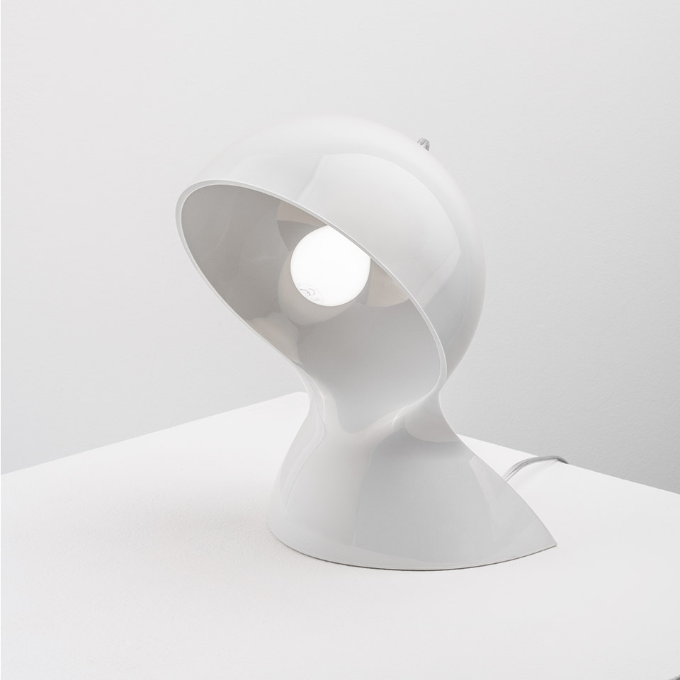 Artemide Dalù table lamp in white, featuring a rotatable spherical shade on a conical base, with exposed bulb facing forward