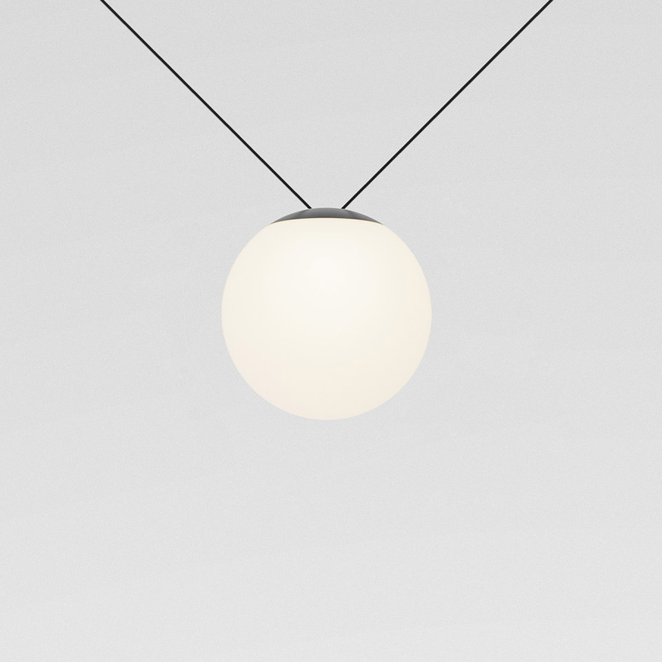 Artemide Funivia pendant lamp: opal white glass sphere suspended by two diagonal black cables meeting at a grey top fitting