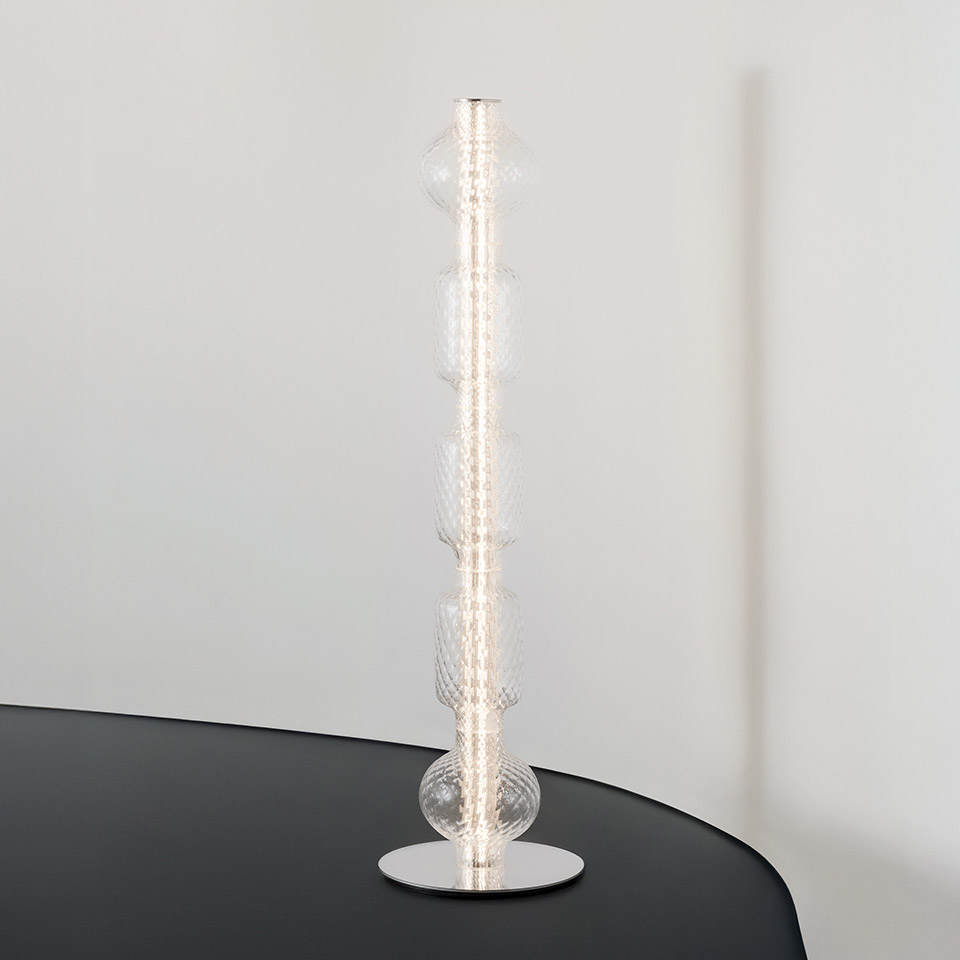 Artemide Alambicco table lamp: tall vertical column of stacked clear glass spheres with integrated LED strip on chrome base