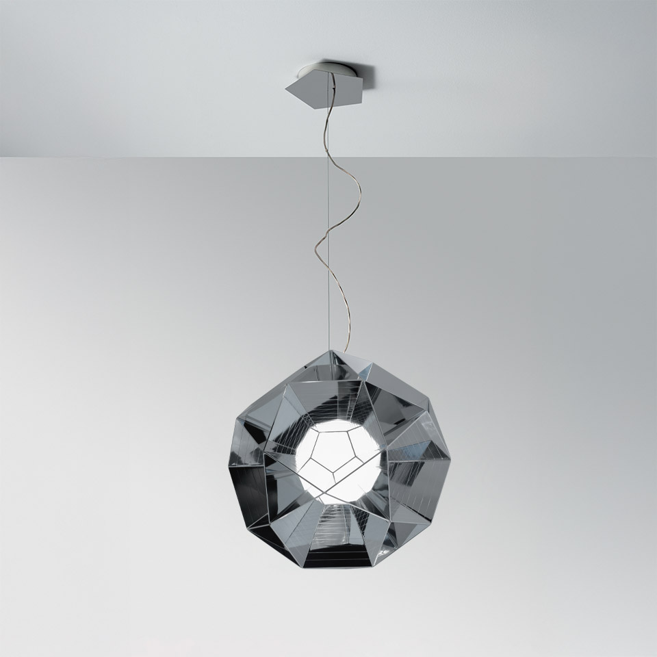 Artemide Arctic pendant lamp with faceted chrome dodecahedron shade and central white globe, suspended by a twisted cable