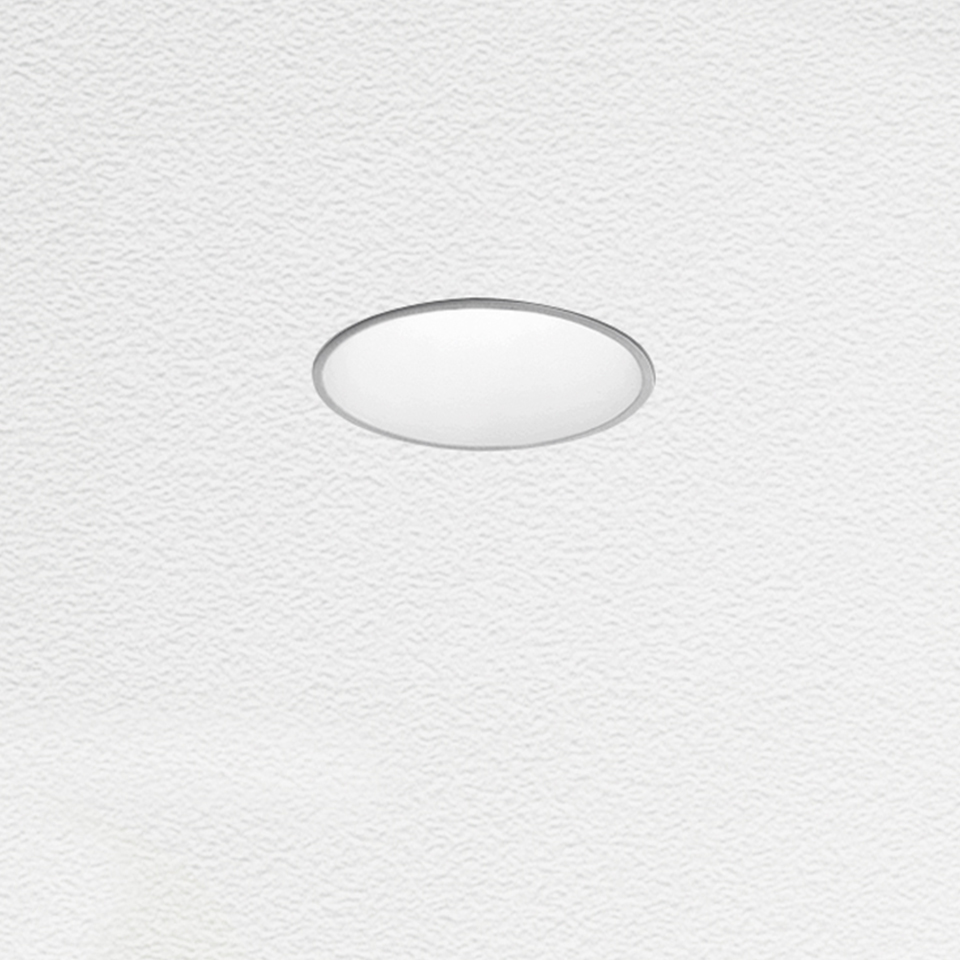 Tagora Incasso 80 by Artemide: flush-mounted round ceiling recessed light with white diffuser and slim chrome trim ring