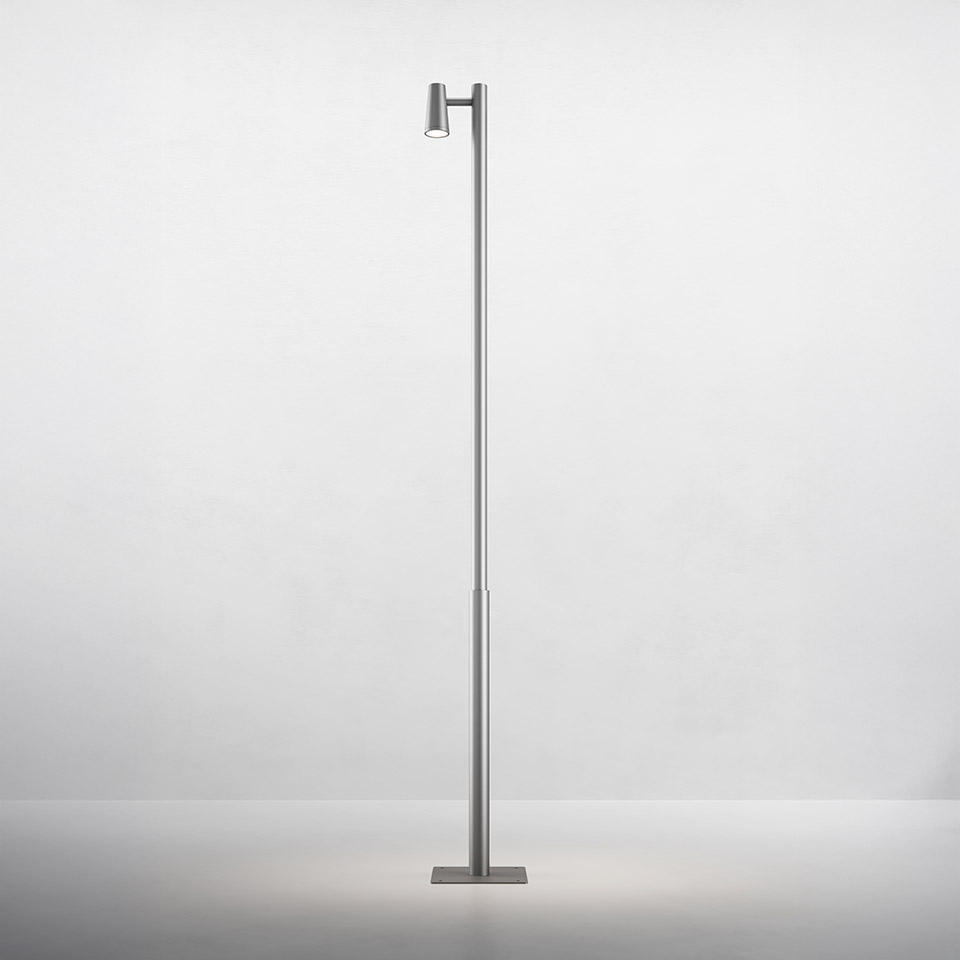 Artemide Conus floor lamp: slim aluminum pole with adjustable cylindrical LED spotlight head on a square base
