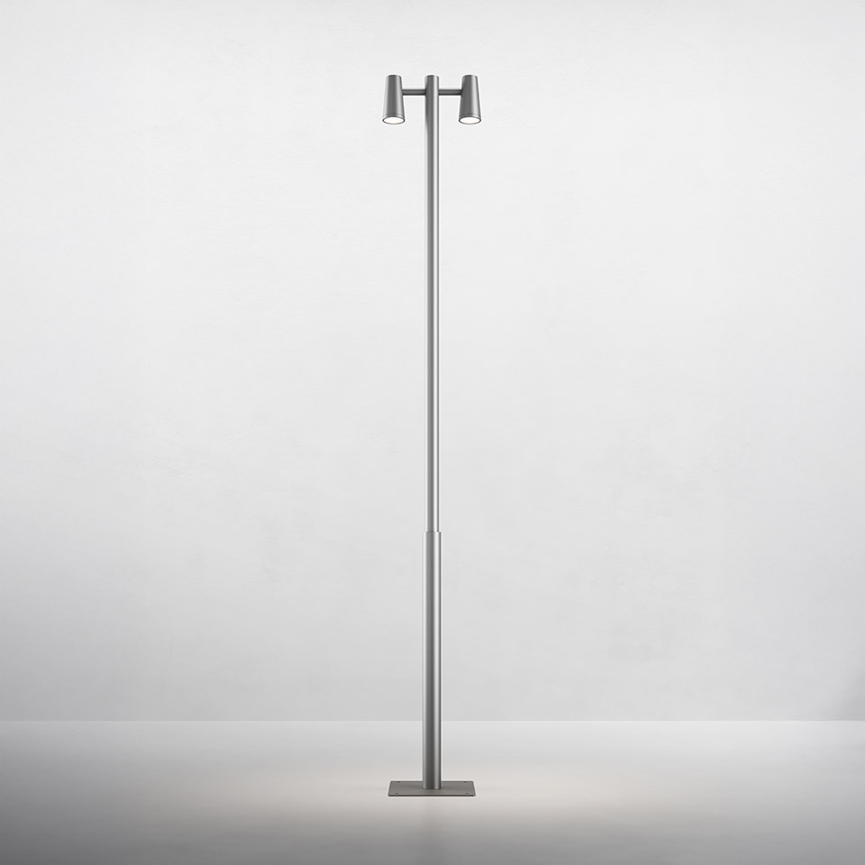 Artemide Conus floor lamp: tall slim aluminum pole with square base and two adjustable cylindrical LED spotlights at the top