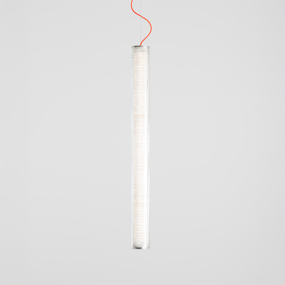 Artemide Criosfera pendant lamp: slim vertical cylindrical diffuser in white mesh, suspended by a red cable