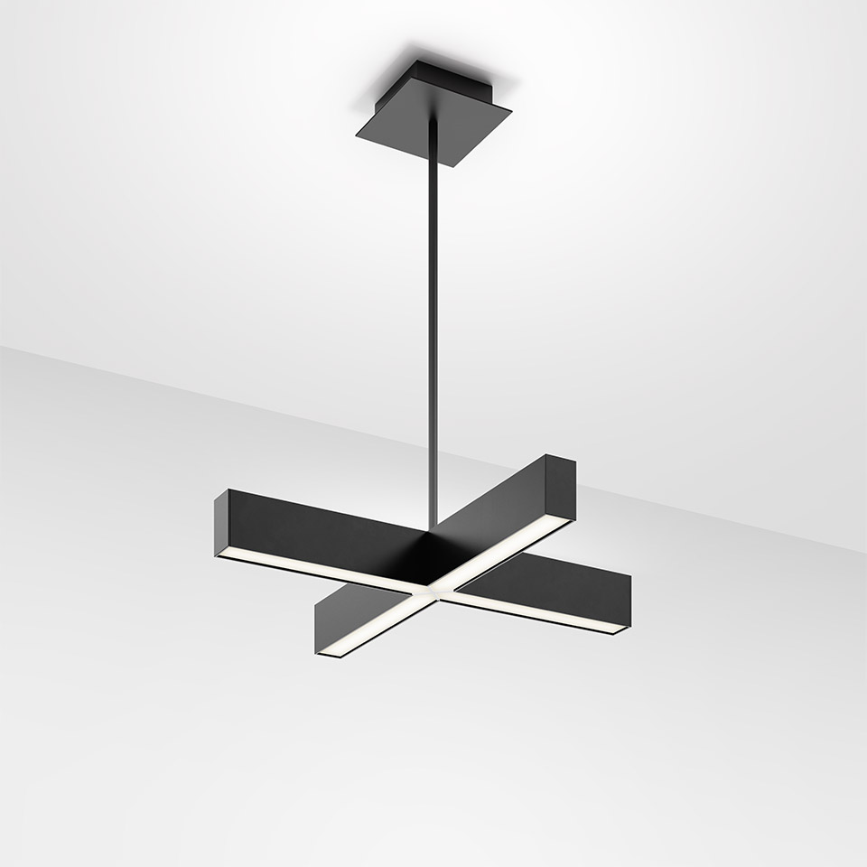 Artemide Tetras pendant lamp in black, featuring a cross-shaped LED structure suspended from the ceiling by a slim rod