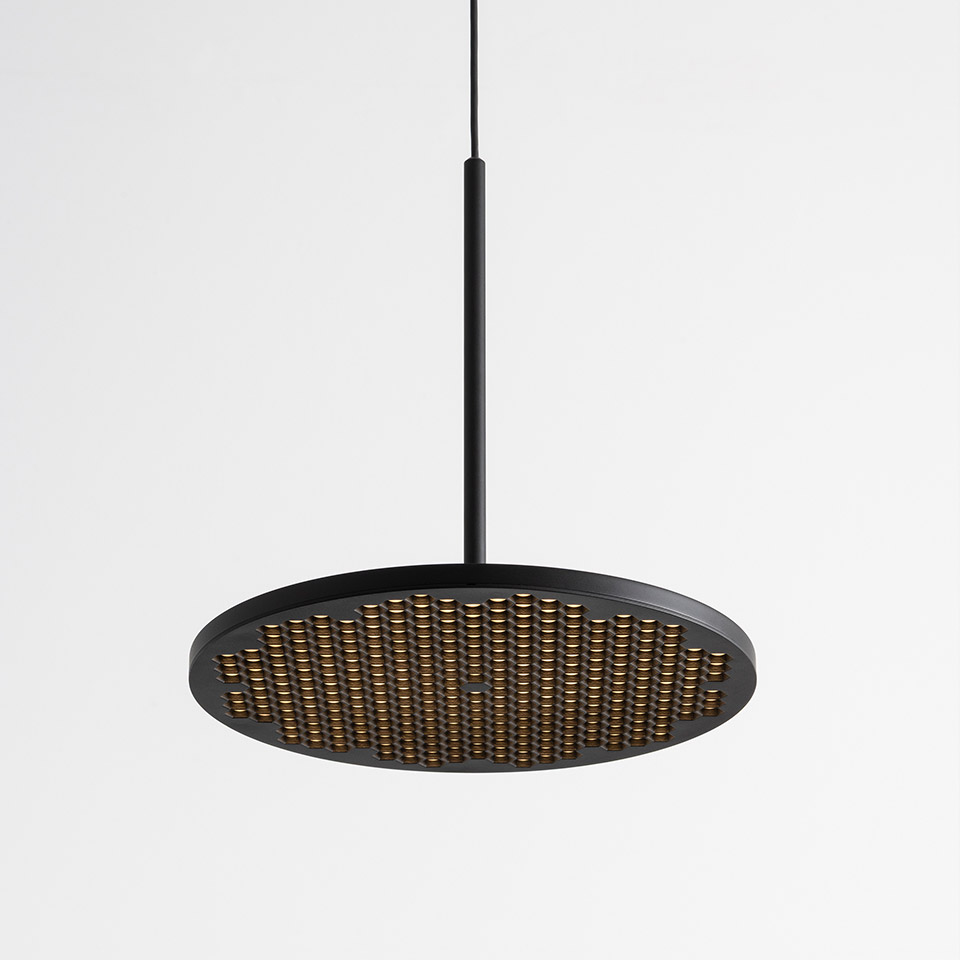 Artemide Helgoland pendant lamp: matte black circular disc with gold LED array, suspended from a thin black rod