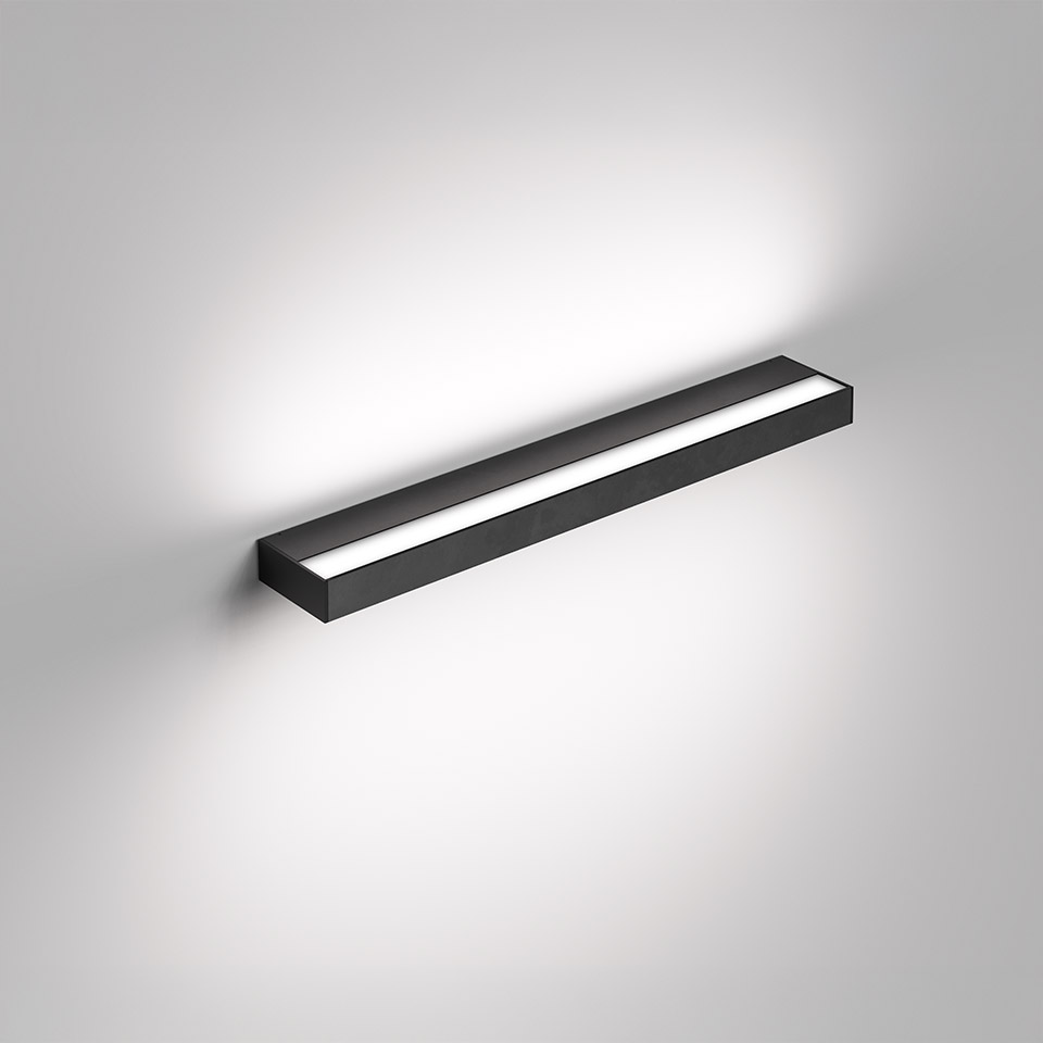 Artemide Hoy Parete wall lamp: sleek horizontal black rectangular bar with central LED strip emitting soft upward and downward light
