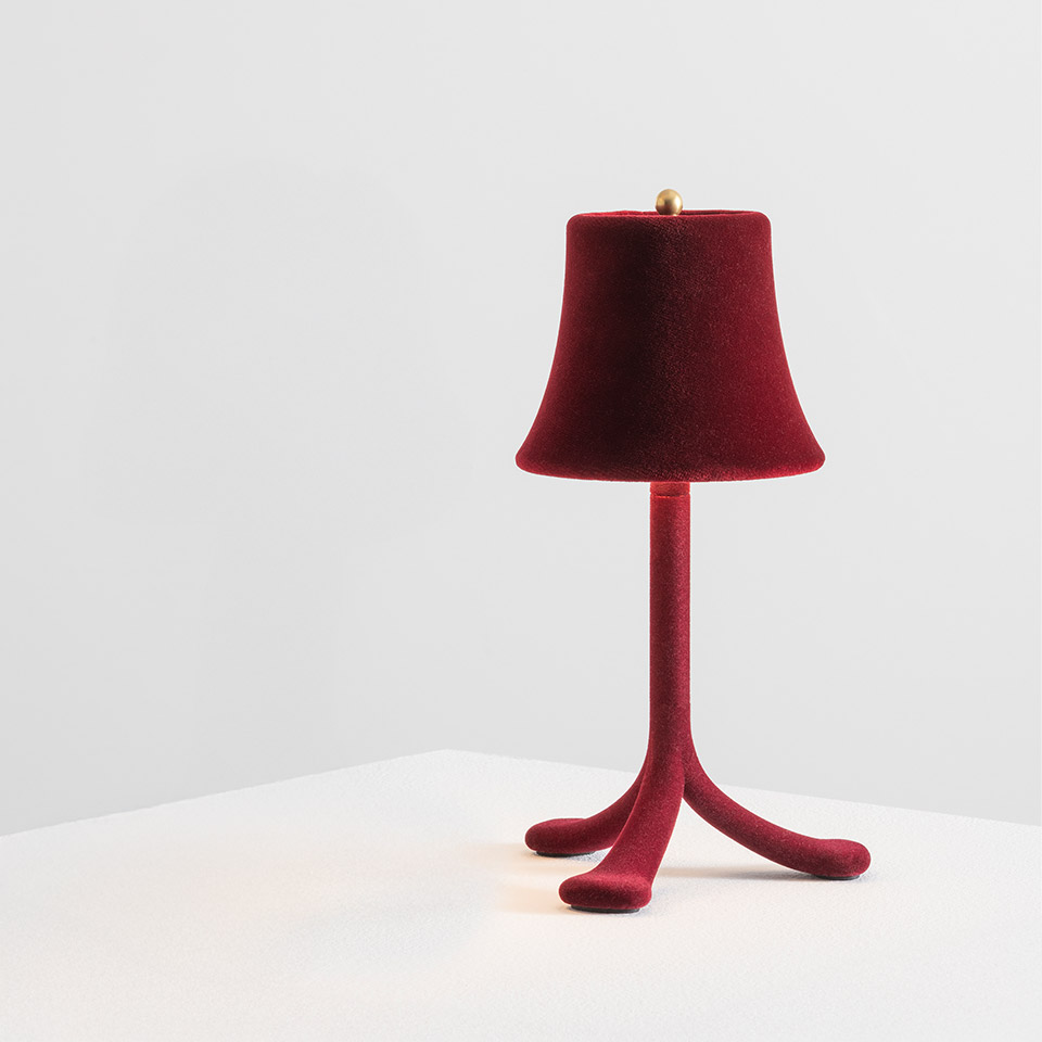 Trois Rois table lamp by Artemide: deep red velvet-flocked shade and tripod base with organic curved legs, gold finial on top