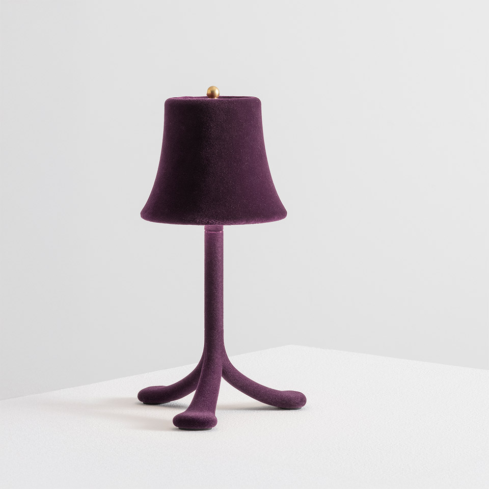 Trois Rois table lamp by Artemide: purple velvet tripod base with organic curved legs, matching bell-shaped shade, gold finial on top