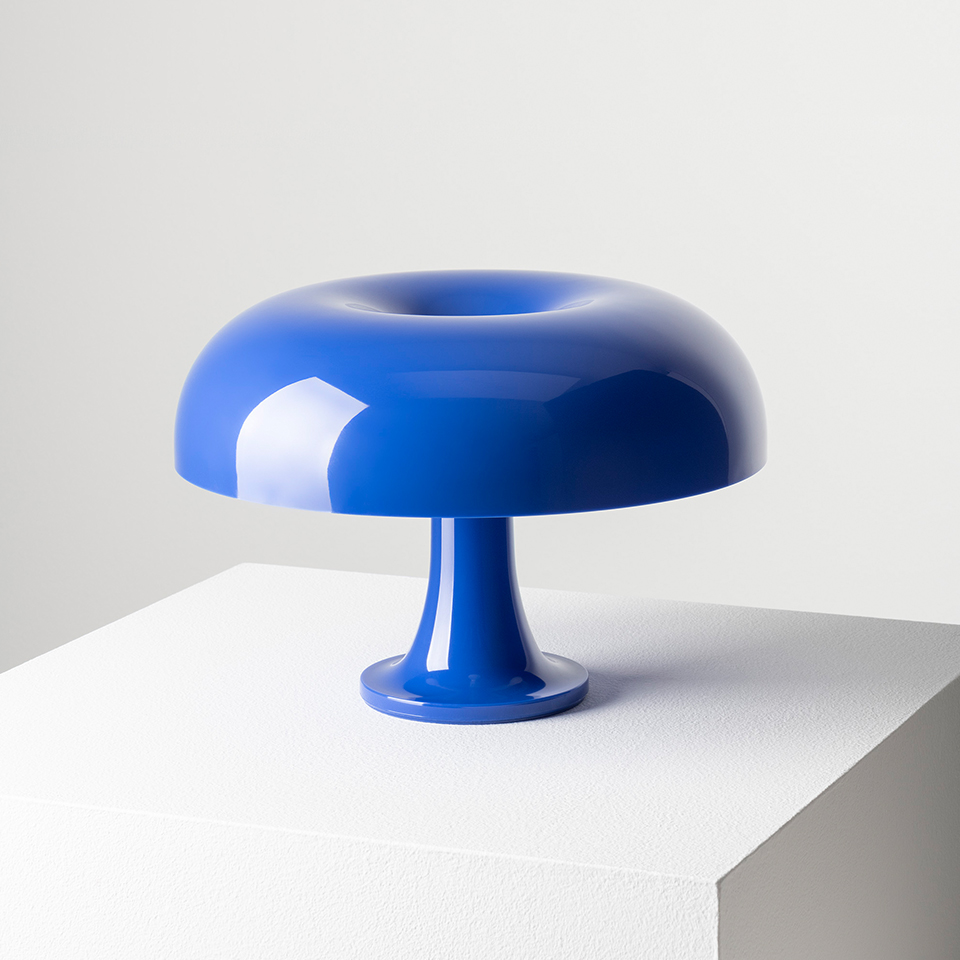 Artemide Nessino table lamp in glossy blue, featuring iconic mushroom-shaped shade with open top and slender pedestal base