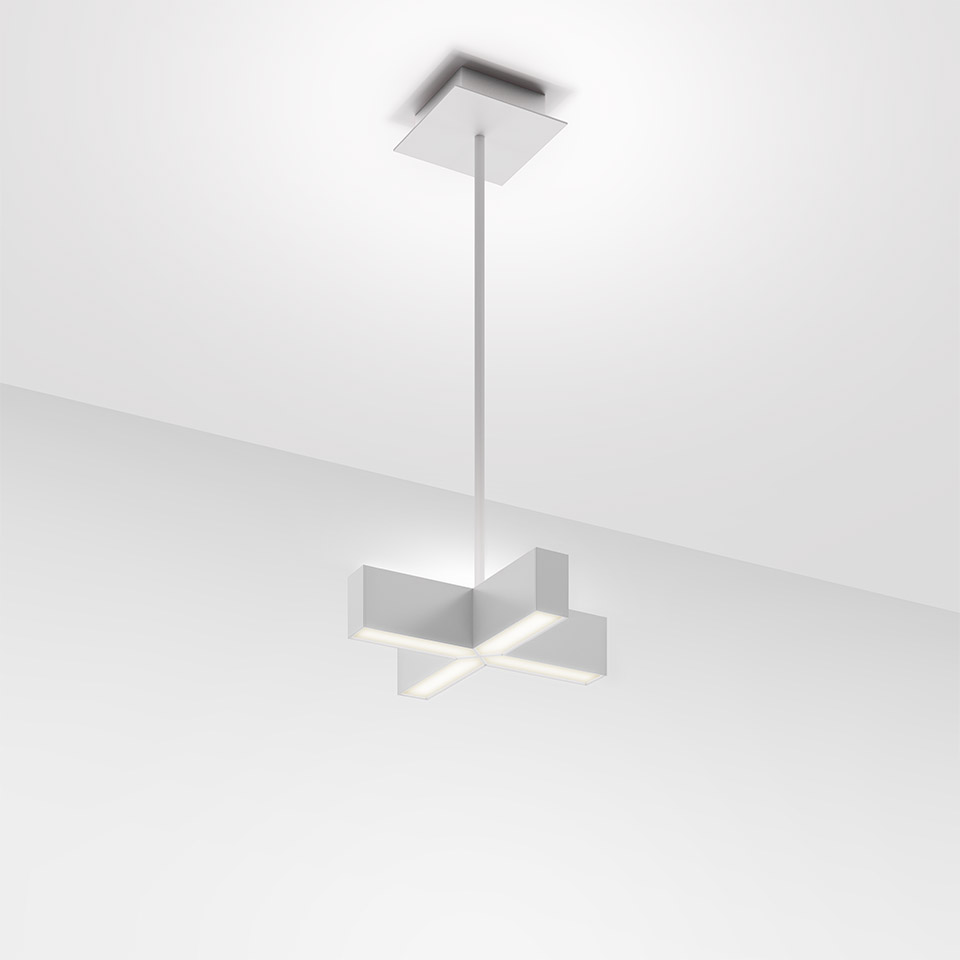 Artemide Tetras pendant lamp: white cross-shaped LED fixture suspended from ceiling by slim rod with square canopy