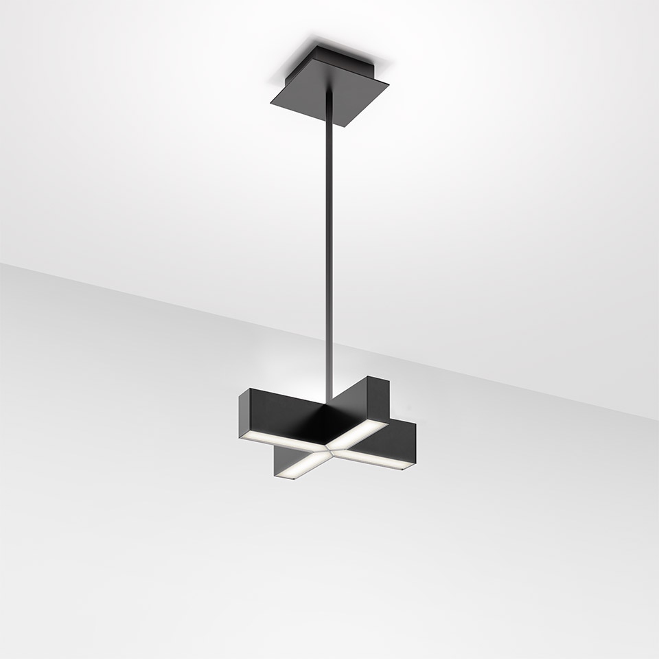 Artemide Tetras pendant lamp in black, cross-shaped LED fixture with four rectangular arms emitting light downward, suspended by a slim rod