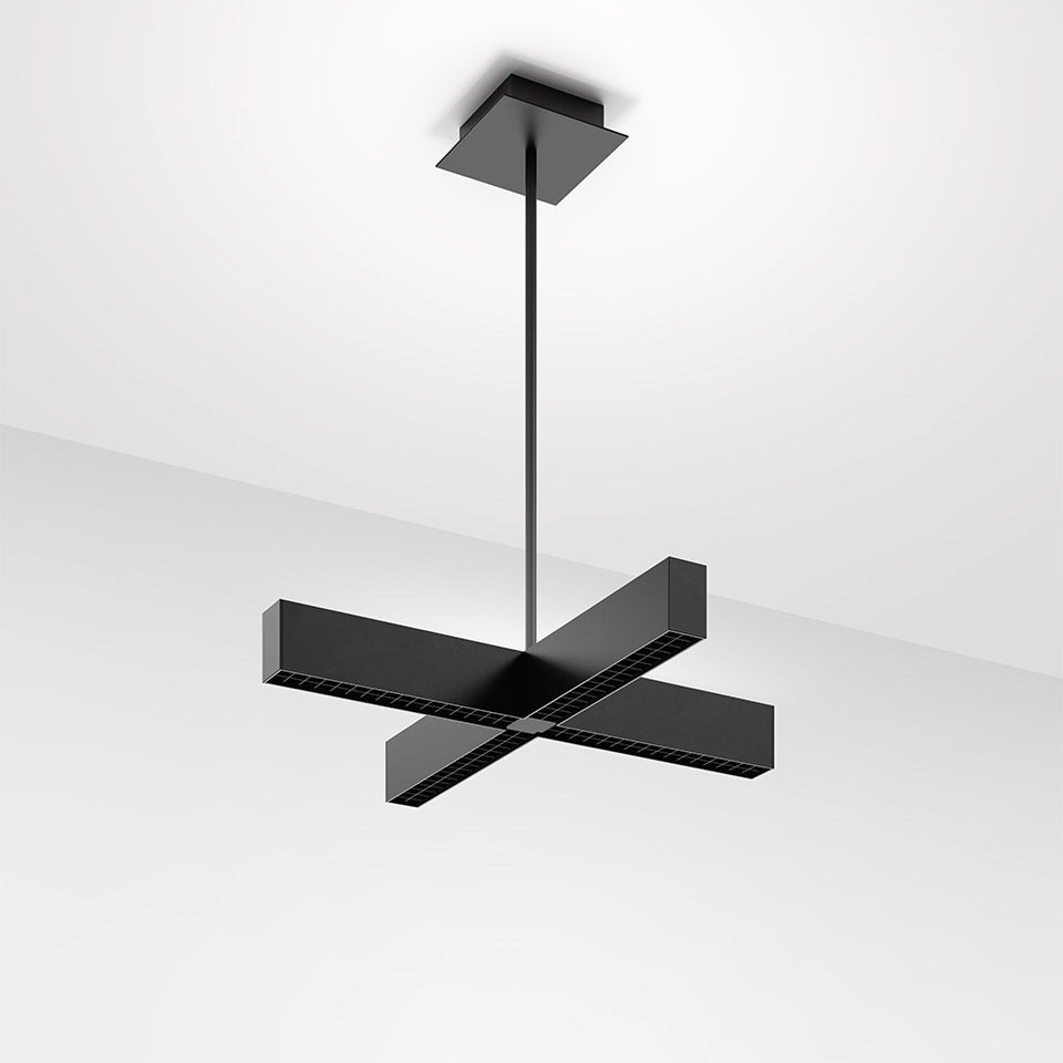 Artemide Tetras pendant lamp in black, featuring a cross-shaped LED structure suspended from the ceiling by a single rod.