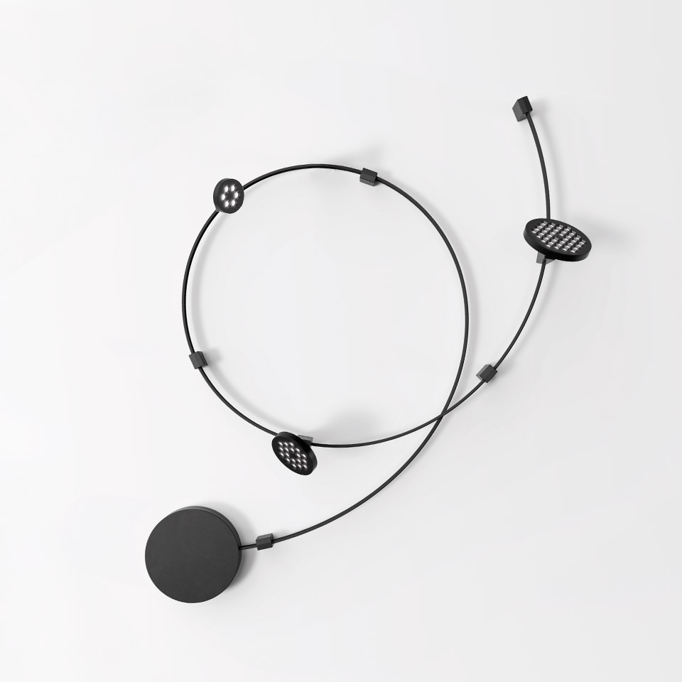 Artemide Sylt Stand Alone wall lamp: black circular wire frame with three flat round LED light modules and one solid disc