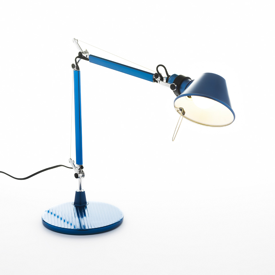 Artemide Tolomeo Micro Tavolo desk lamp in blue, with articulated arm, conical shade, and circular ribbed base