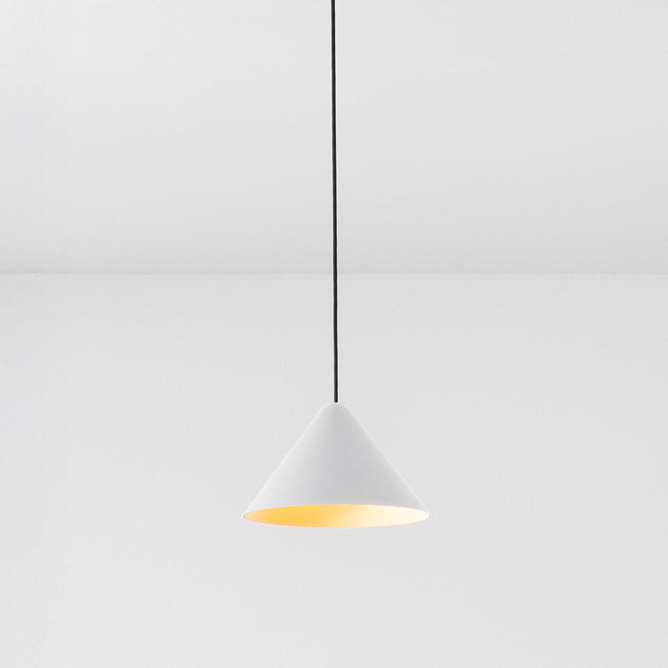 Artemide Vea Suspension pendant lamp: white conical shade with warm golden interior, suspended by a black cord