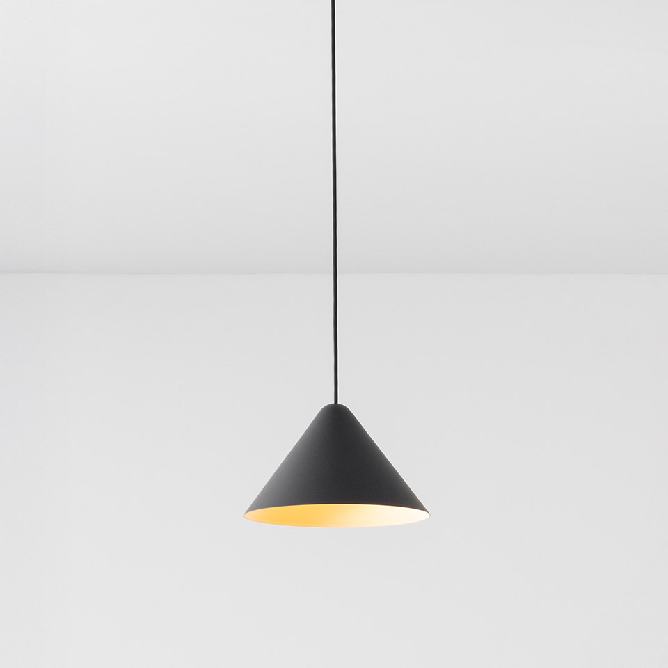 Vea Suspension pendant lamp by Artemide: matte black conical shade with warm gold interior, suspended from a black cord