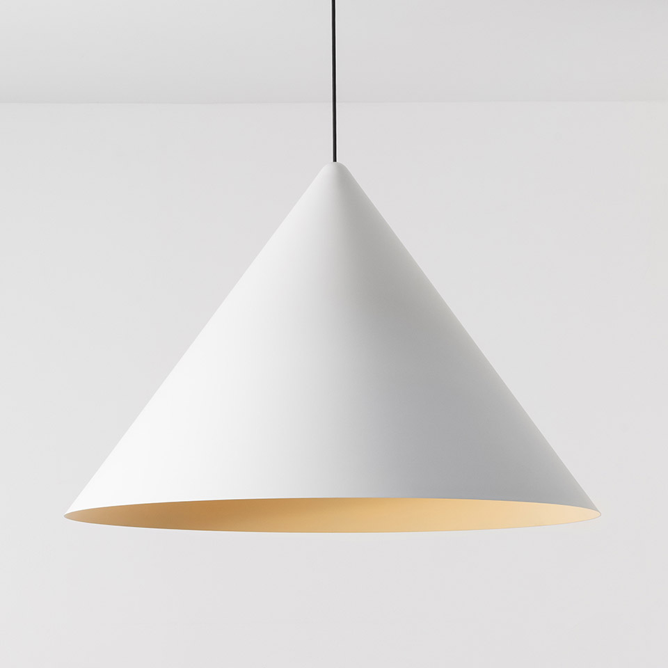 Artemide Vea Suspension pendant lamp with wide conical white matte shade and warm gold interior, hanging from a black cord