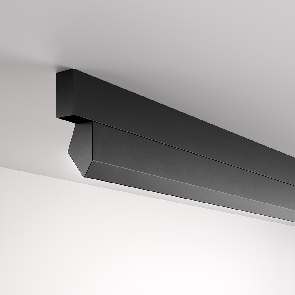 Artemide A.24 Wall Washer: sleek black linear LED ceiling fixture with angled diffuser for directional wall-washing light