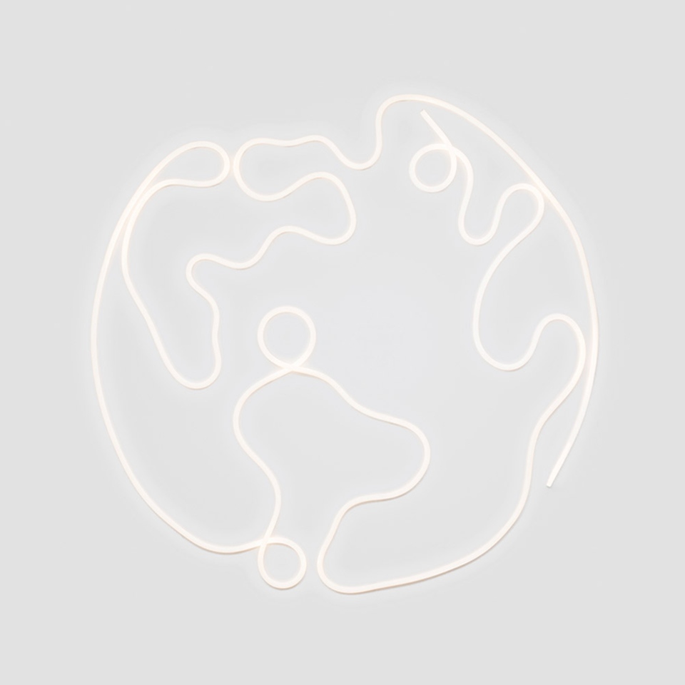 La Linea 25 by Artemide: glowing white neon light tube shaped as a world map outline, wall-mounted on light grey background