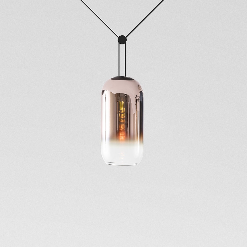 Artemide Funivia pendant lamp: capsule-shaped glass shade with copper-to-clear gradient, visible filament bulb, suspended on black cables - 2
