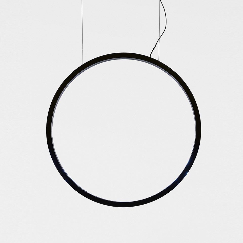 Artemide O pendant lamp: large circular black ring with integrated LED, suspended by thin black cables on white background