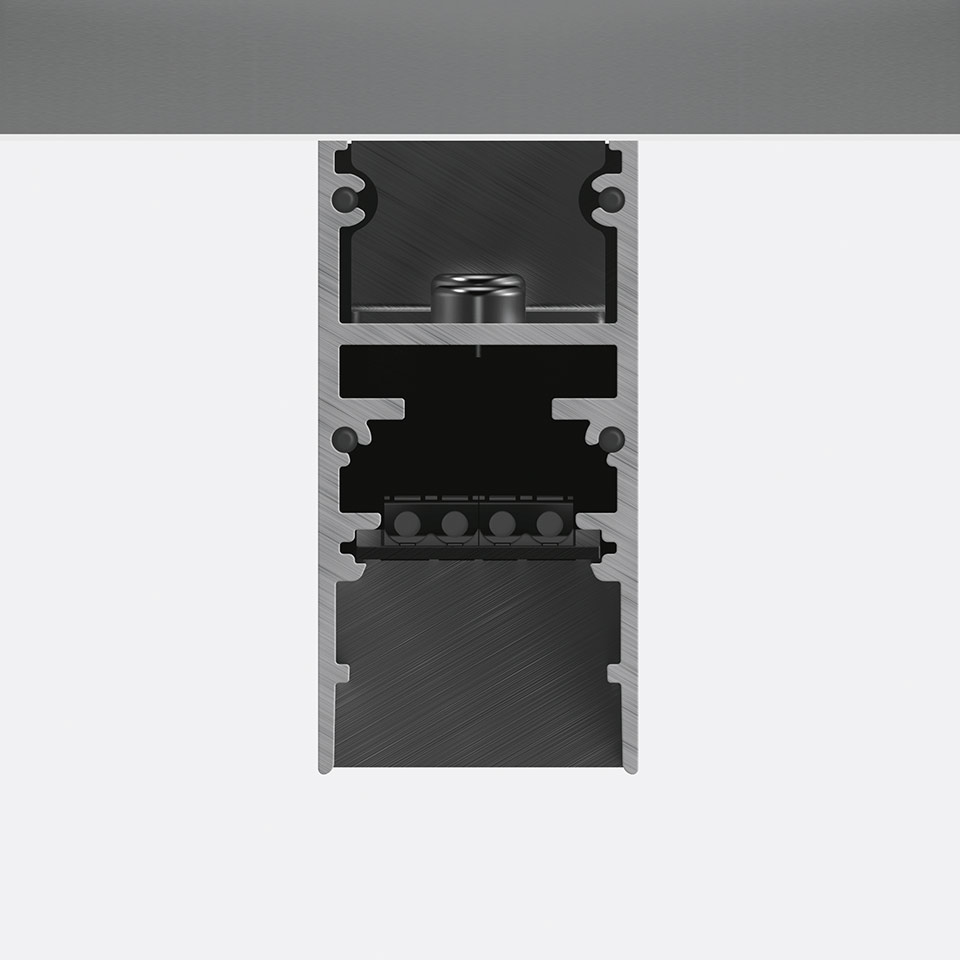 Cross-section of Artemide A.24 magnetic track system showing aluminum profile with integrated magnetic rail and electrical connectors