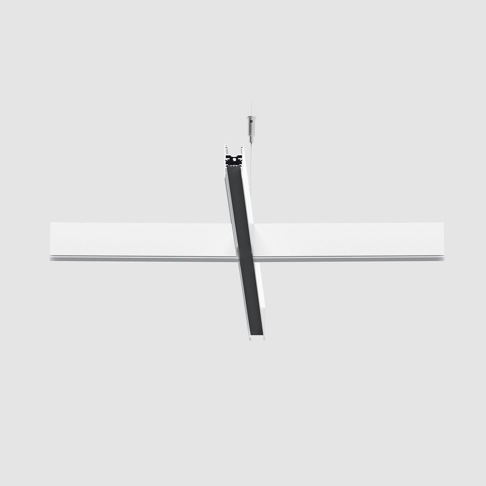 Artemide A.24 Magnetic Track system: white horizontal rail with a dark angled magnetic spotlight module attached at center