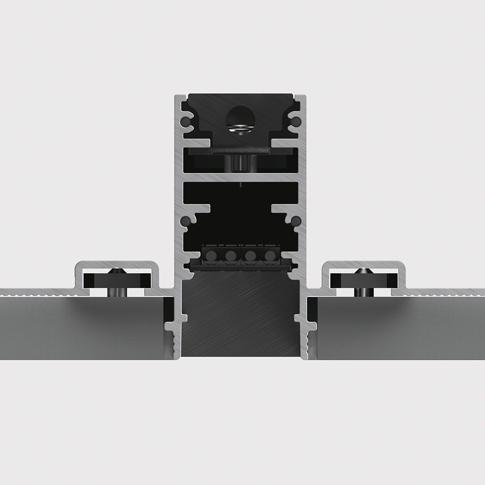 Cross-section detail of Artemide A.24 magnetic track system showing recessed aluminum profile with magnetic rail and mounting hardware