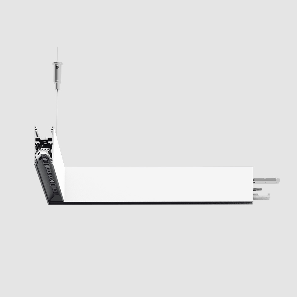 Artemide A.24 Diffused Emission recessed linear LED fixture in white, shown suspended with steel cable and modular connector