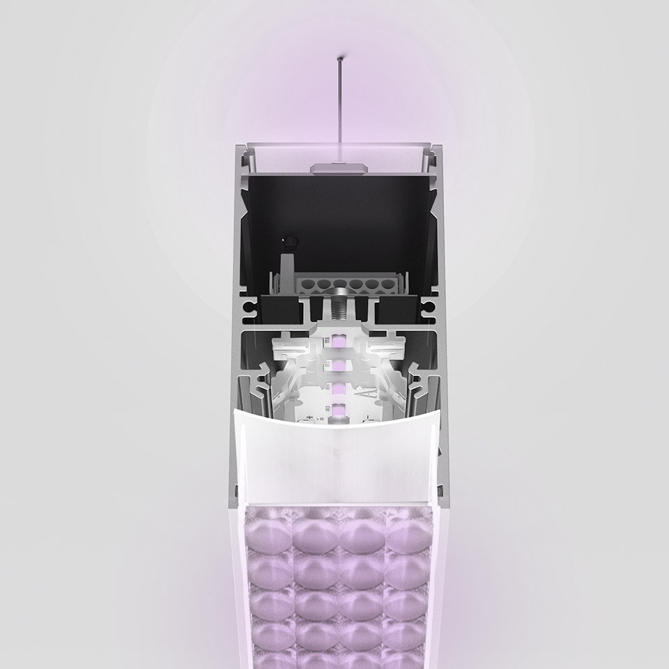 Cross-section of Artemide A.39 pendant lamp showing internal LED components, aluminum housing, and bubble-textured diffuser emitting purple light