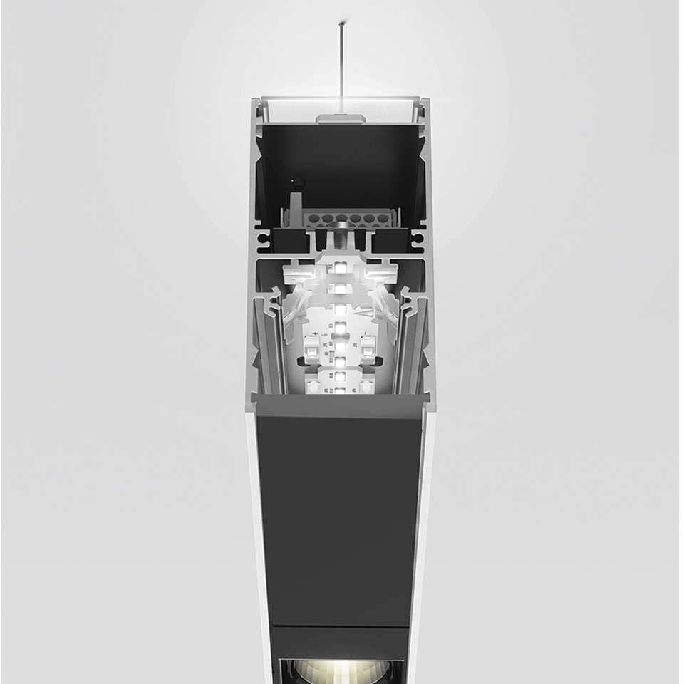 Cross-section of Artemide A.39 pendant/ceiling light revealing internal LED module, optical system, and aluminum extruded profile in black and silver