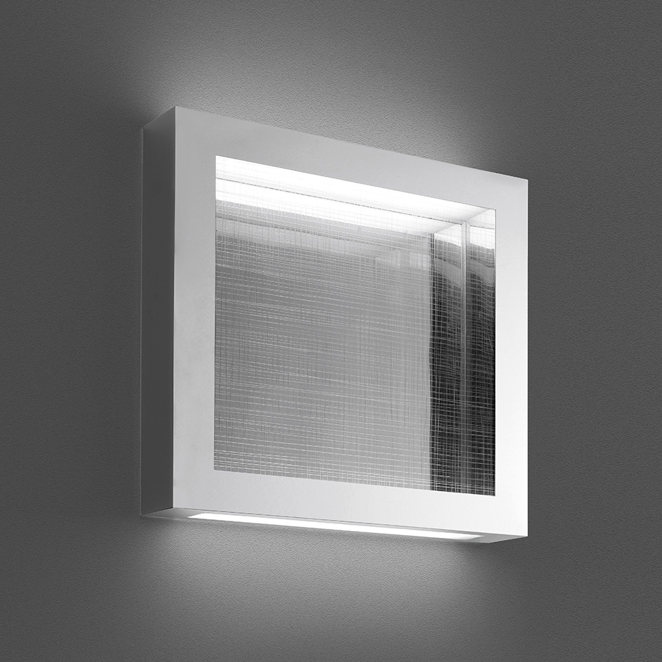 Artemide Altrove wall/ceiling lamp: square white frame with textured glass panel emitting soft LED light from top and bottom edges