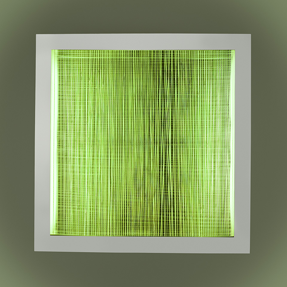 Artemide Altrove wall/ceiling lamp with white square frame and glowing green woven textile diffuser creating vibrant light pattern