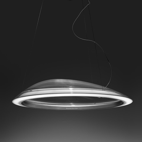 Artemide Ameluna pendant lamp: sleek circular disc shape in transparent glass with a glowing white LED ring, suspended by thin black cables