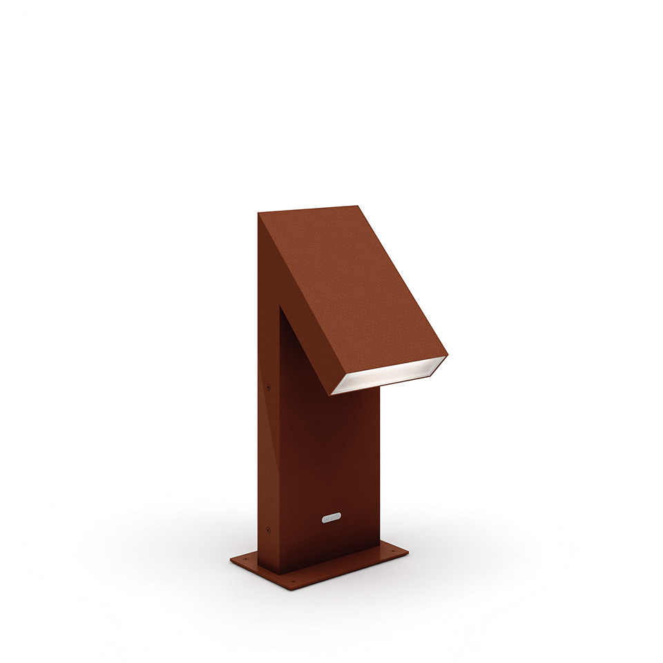 Artemide Chilone outdoor bollard light in corten red-brown finish, geometric angular design with angled LED light head on rectangular post