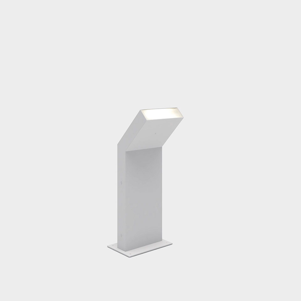 Artemide Chilone outdoor bollard light in white, angular geometric design with angled LED top, mounted on a flat rectangular base