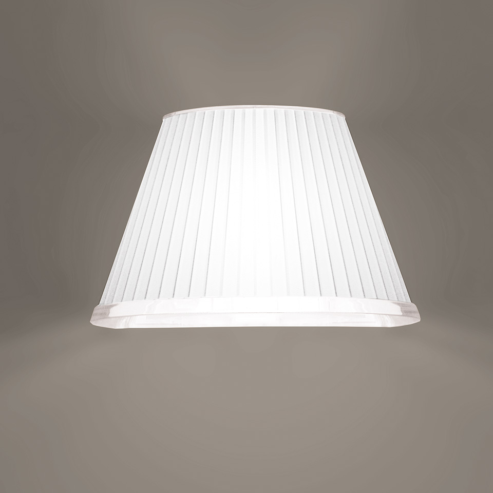 Artemide lamp shade: white pleated fabric, conical shape, wider at top, emitting soft diffused light from the bottom
