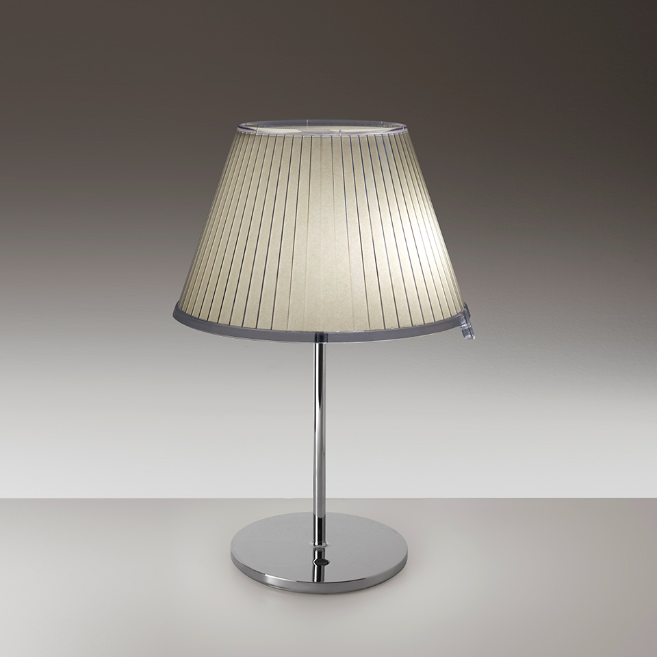 Artemide Choose table lamp with pleated fabric shade, chrome stem and round base, emitting warm diffused light