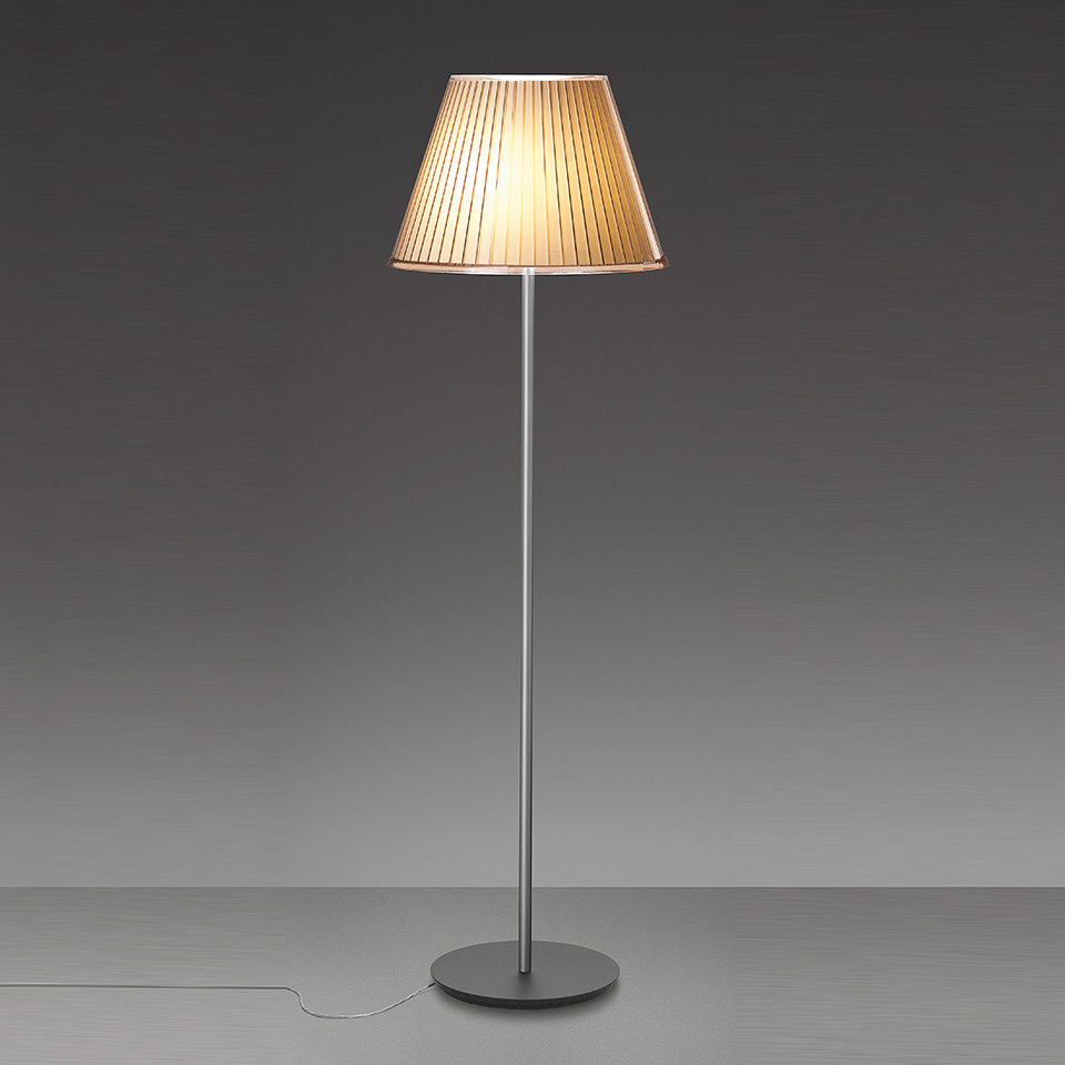 Artemide Choose Mega floor lamp with pleated fabric shade in warm tones on a slim chrome stem and round dark base