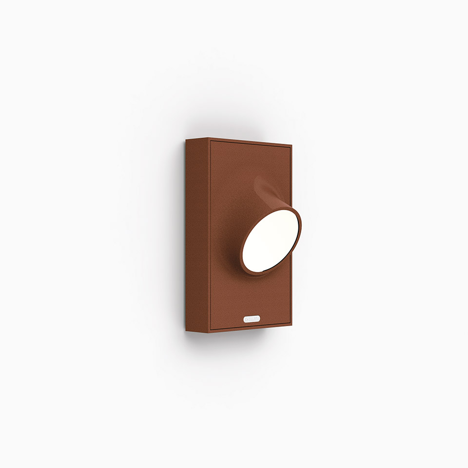 Artemide Ciclope wall lamp in terracotta red, rectangular body with rotating oval LED light head and dimmer switch