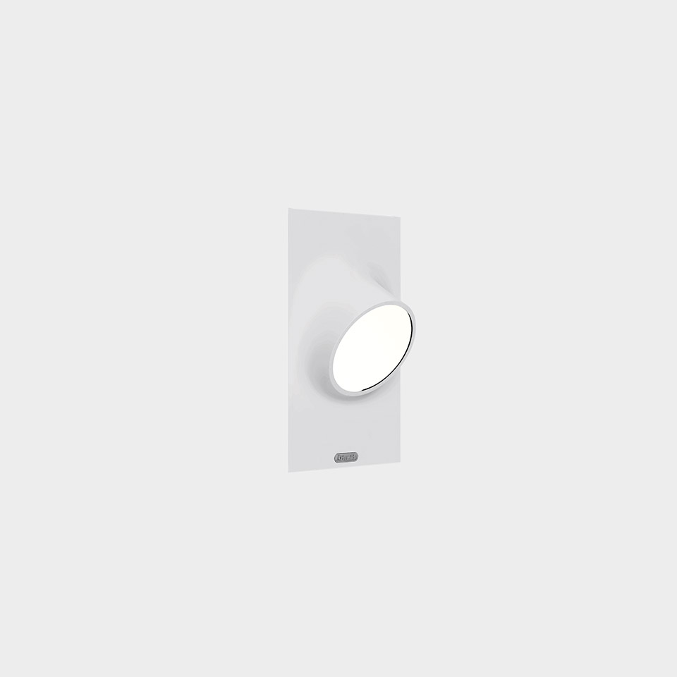 Artemide Ciclope recessed wall light: white rectangular flush plate with circular LED lens and chrome ring, minimalist design